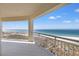 Expansive balcony featuring tile floors with endless views of the beach and ocean at 1170 Gulf Blvd # 2001, Clearwater, FL 33767