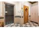 Modern bathroom boasts a sleek glass-enclosed shower and coordinated tile and decor at 1170 Gulf Blvd # 2001, Clearwater, FL 33767
