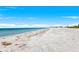 Scenic beach panorama with clear skies above a sandy shore meeting gentle ocean waves at 1170 Gulf Blvd # 2001, Clearwater, FL 33767