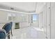 Dining area featuring luxury marble flooring and a mini-bar with views to the outside at 1170 Gulf Blvd # 2001, Clearwater, FL 33767