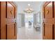 Welcoming foyer with double doors, marble floors, and views of the bright living area and ocean at 1170 Gulf Blvd # 2001, Clearwater, FL 33767