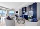 Elegant living room with stylish seating, wet bar, and scenic ocean views creating a perfect relaxation space at 1170 Gulf Blvd # 2001, Clearwater, FL 33767