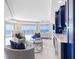 Bright open-concept living area with floor-to-ceiling windows offering stunning ocean views and elegant decor at 1170 Gulf Blvd # 2001, Clearwater, FL 33767