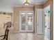 The grand foyer provides views of the pool at 12333 Woodlands Cir, Dade City, FL 33525