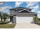 Charming two-story home with a two-car garage and well-maintained landscaping at 1308 22Nd E St, Palmetto, FL 34221