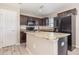 Kitchen featuring granite countertops, a center island, and stainless steel appliances at 1308 22Nd E St, Palmetto, FL 34221