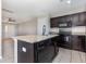 Spacious kitchen featuring granite countertops, stainless steel appliances, and center island at 1308 22Nd E St, Palmetto, FL 34221