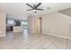 Open-concept living room with tile floors and abundant natural light at 1308 22Nd E St, Palmetto, FL 34221