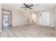 Spacious living room featuring tile floors, staircase, and neutral paint at 1308 22Nd E St, Palmetto, FL 34221