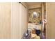 Bathroom with a single sink vanity and a large closet at 13225 101St St # 462, Largo, FL 33773