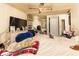 Bedroom with a large bed, and a dresser with a television on top at 13225 101St St # 462, Largo, FL 33773