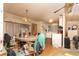 Casual dining area features an outdated chandelier, and is cluttered with personal items at 13225 101St St # 462, Largo, FL 33773