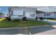 Well-maintained single story home with manicured lawn and covered parking at 13225 101St St # 462, Largo, FL 33773