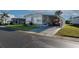 Charming single-story home features a carport, well-maintained lawn, and a welcoming facade at 13225 101St St # 462, Largo, FL 33773