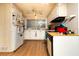 Efficient kitchen with natural lighting, essential appliances, and ample cabinet space at 13225 101St St # 462, Largo, FL 33773