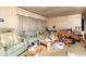 A living room filled with personal items, needs to be decluttered and updated at 13225 101St St # 462, Largo, FL 33773