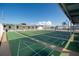 Organized shuffleboard courts with ample seating and a covered spectator area on a sunny day at 13225 101St St # 462, Largo, FL 33773
