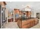 Spacious kitchen with a large island, stainless steel appliances, and custom cabinetry at 1336 51St Ne Ave, St Petersburg, FL 33703