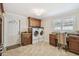 Laundry room with sink and counter space, washer, dryer and natural light at 1336 51St Ne Ave, St Petersburg, FL 33703