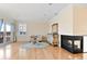 A spacious main bedroom suite features a cozy sitting area with a fireplace and balcony access at 1336 51St Ne Ave, St Petersburg, FL 33703