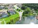 Lakefront community with private docks, screened pool, beautiful landscaping and water views at 21807 Amelia Rose Way, Land O Lakes, FL 34637