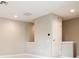 Bright bonus room with neutral walls at 21807 Amelia Rose Way, Land O Lakes, FL 34637