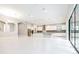 Spacious, open-concept kitchen features a large island, stainless steel appliances, and modern lighting at 21807 Amelia Rose Way, Land O Lakes, FL 34637