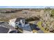 Aerial view of the property showcasing its location near a beautiful, green, conservation area and well-maintained surroundings at 22990 Scaglione Dr, Lutz, FL 33549