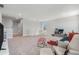 Spacious bonus room featuring neutral carpet, lots of room to entertain and recessed lighting at 22990 Scaglione Dr, Lutz, FL 33549