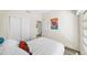 Bright bedroom with a closet, light walls and wood-look flooring at 2905 Bay St, Sarasota, FL 34237