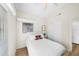 Bright bedroom featuring a comfortable bed, closet, and window with natural light at 2905 Bay St, Sarasota, FL 34237