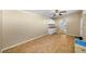 Spacious flex space with tile flooring, storage cabinets, and sink at 2905 Bay St, Sarasota, FL 34237