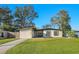 Charming home exterior with a well-maintained lawn and inviting curb appeal at 2905 Bay St, Sarasota, FL 34237