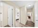 Hallway featuring wood floors that connects bedrooms and main living area at 2905 Bay St, Sarasota, FL 34237