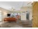Bright living room featuring modern furnishings, ceiling fan, and wood flooring at 2905 Bay St, Sarasota, FL 34237