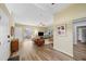 Bright living room featuring wood floors, neutral paint, modern furniture, and multiple windows at 2905 Bay St, Sarasota, FL 34237