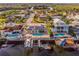 Waterfront home featuring a private pool, boat dock, and picturesque canal views at 3939 Rudder Way, New Port Richey, FL 34652