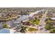 Waterfront homes with private docks line a canal in a residential neighborhood with palm trees and manicured lawns at 3939 Rudder Way, New Port Richey, FL 34652