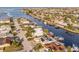 A waterfront property with solar panels and a private boat dock for easy water access at 3939 Rudder Way, New Port Richey, FL 34652