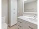 Well-lit bathroom with a sleek vanity, ample storage, and a modern design at 3939 Rudder Way, New Port Richey, FL 34652