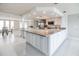 Bright, open kitchen featuring granite countertops, stainless appliances, and lots of cabinet space at 3939 Rudder Way, New Port Richey, FL 34652