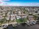 Aerial view of a residential neighborhood with waterfront homes, private docks, and a network of navigable waterways at 5033 Blue Heron Dr, New Port Richey, FL 34652