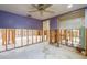 Bedroom showing wall studs and open doorway at 5033 Blue Heron Dr, New Port Richey, FL 34652