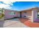 Charming single-Gathering home with a sitting bench on the front porch and well-maintained landscaping at 5033 Blue Heron Dr, New Port Richey, FL 34652