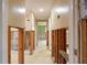 Hallway with studs between rooms showing open doorway at 5033 Blue Heron Dr, New Port Richey, FL 34652