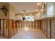 Bright kitchen area featuring white cabinets, recessed lighting and an open floor plan at 5033 Blue Heron Dr, New Port Richey, FL 34652