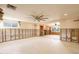 Spacious living room featuring abundant natural light and an open floor plan at 5033 Blue Heron Dr, New Port Richey, FL 34652