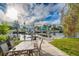 Enjoy outdoor dining on the patio overlooking the canal, complete with boat docks and picturesque waterfront views at 5033 Blue Heron Dr, New Port Richey, FL 34652