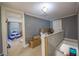 Second floor hallway with a view of the playroom, stairs and natural light at 602 Nw Drane St, Plant City, FL 33563