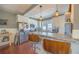 Updated kitchen with stainless steel appliances, granite countertops, and stylish breakfast bar at 602 Nw Drane St, Plant City, FL 33563